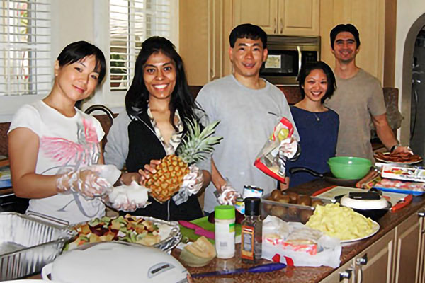 Preparing donations into a dinner for the families.