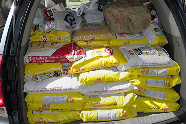 Preparing donations into a dinner for the families.